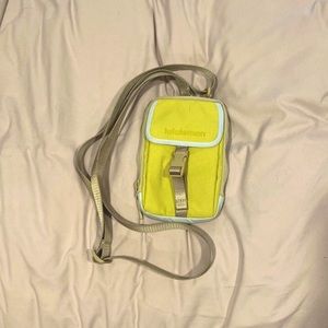 Lululemon crossbody with main zipper pocket and phone holder clasp pocket